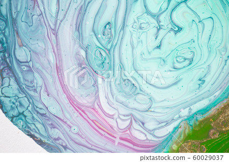 The girl creates a picture with abstraction in bright colors. The girl creates a picture with abstraction in bright colors. 60029037