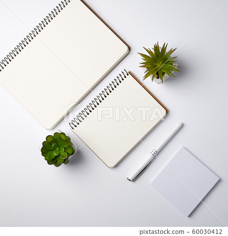 open spiral notebook with empty sheets, pots with open spiral notebook with empty sheets, pots with 60030412