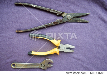 Metal, iron, shiny, adjustable wrench, pliers Metal, iron, shiny, adjustable wrench, pliers 60034686