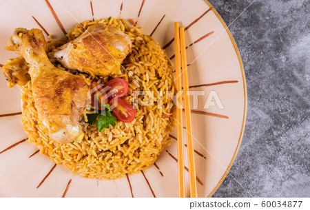 Delicious risotto with chicken top view. 60034877