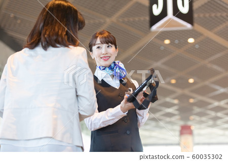 Airport ground staff guiding 60035302
