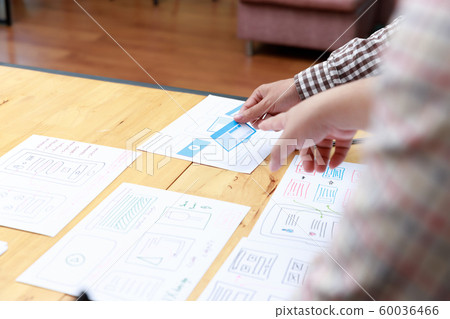 Graphic designers work together with UX UI Graphic designers work together with UX UI 60036466