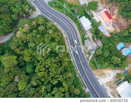 Mountain road tropical forest on island 60036738