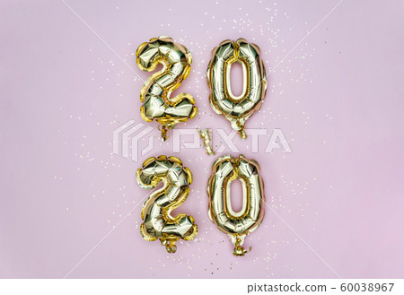 Vertical 2020 Happy New year celebration. Gold foil balloons numeral 2020 and golden stars on pastel Vertical 2020 Happy New year celebration. Gold foil balloons numeral 2020 and golden stars on pastel 60038967