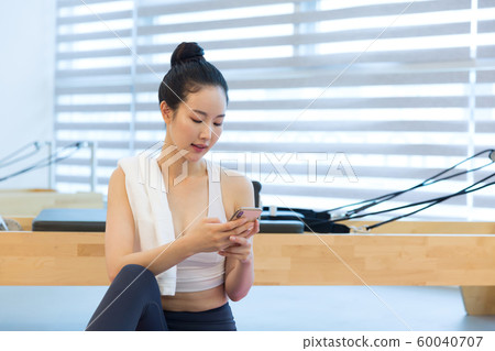 Healthy life, exercising pilates using pilates device 237 60040707