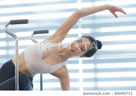 Healthy life, exercising pilates using pilates device 187 Healthy life, exercising pilates using pilates device 187 60040751