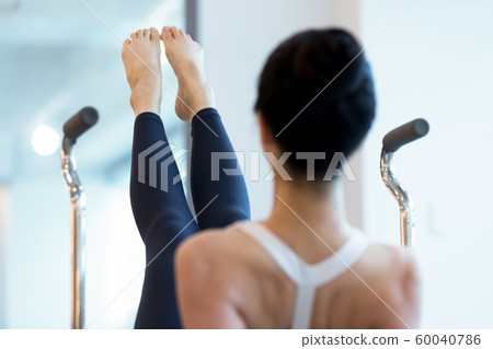 Healthy life, exercising pilates using pilates device 177 60040786