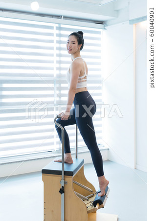 Healthy life, exercising pilates using pilates device 120 60040901