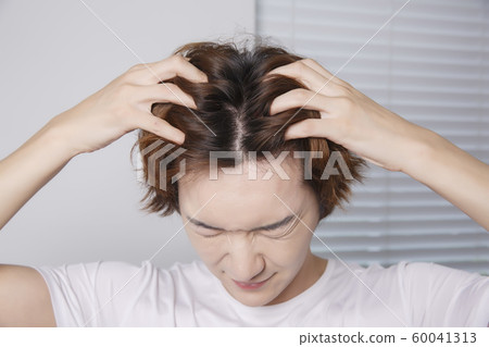 Close-up portrait of attractive young asian man, single man's lifestyle 094 60041313