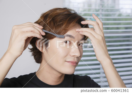 Close-up portrait of attractive young asian man, single man's lifestyle 055 Close-up portrait of attractive young asian man, single man's lifestyle 055 60041361