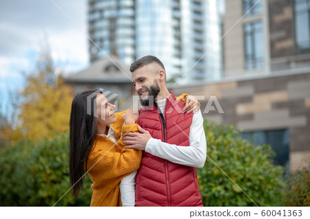 Nice young woman looking at her boyfriend 60041363