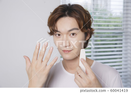 Close-up portrait of attractive young asian man, single man's lifestyle 080 Close-up portrait of attractive young asian man, single man's lifestyle 080 60041419