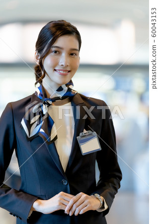 Female airport staff Female airport staff 60043153