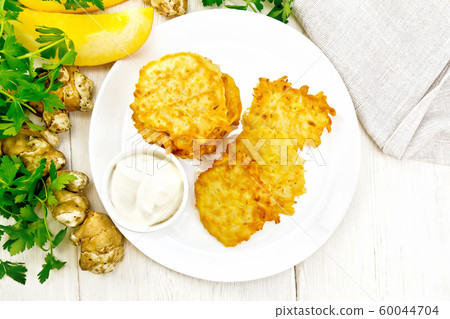 Pancakes of pumpkin with Jerusalem artichoke_3 60044704