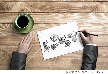 Businesswoman sketching teamwork concept Businesswoman sketching teamwork concept 60045170
