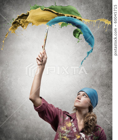 She is painting her world She is painting her world 60045715