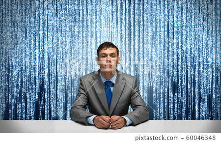 Handsome man folded hands and having serious face Handsome man folded hands and having serious face 60046348