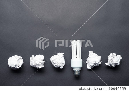 Fluorescent lamp and crumpled white paper balls 60046569