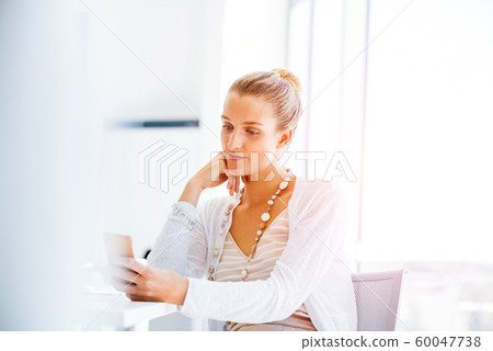 Elegant office worker Elegant office worker 60047738