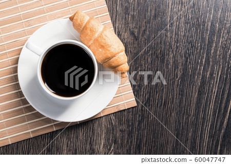 Cup of espresso coffee on wooden table Cup of espresso coffee on wooden table 60047747