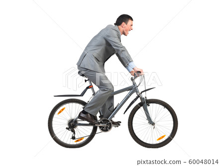 Businessman on bike hurry to work Businessman on bike hurry to work 60048014