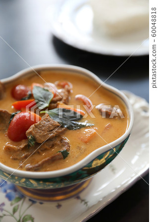 Roasted Duck in Red Curry with rice , Traditional Thai food 60048818