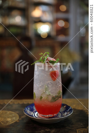 Strawberry mojito cocktail drink on wood background 60048821