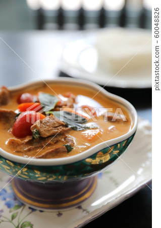 Roasted Duck in Red Curry with rice , Traditional Thai food Roasted Duck in Red Curry with rice , Traditional Thai food 60048826