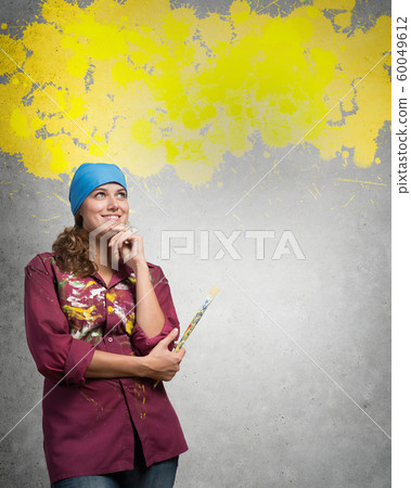 She is painting her world 60049612