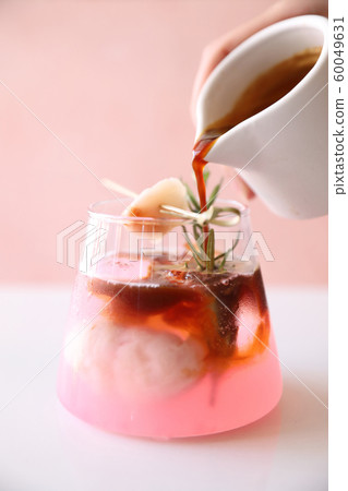 lychee juice with coffee in pink background lychee juice with coffee in pink background 60049631