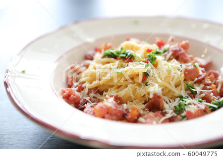 Spaghetti white sauce (Spaghetti Carbonara) with bacon and garlic , on wood table background Spaghetti white sauce (Spaghetti Carbonara) with bacon and garlic , on wood table background 60049775