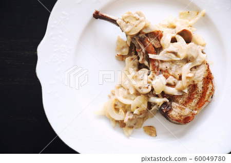 Pork chop with mushroom sauce Pork chop with mushroom sauce 60049780