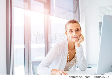 Elegant office worker Elegant office worker 60050723