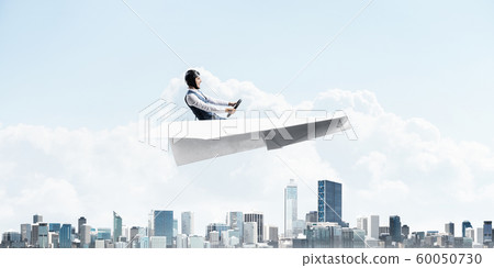 Business motivation concept with pilot airplane Business motivation concept with pilot airplane 60050730