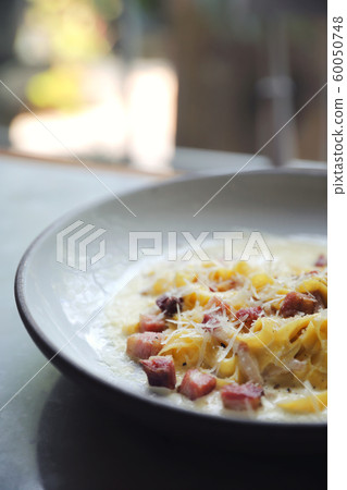 fettuccine carbonara , fettuccine pasta spaghetti with bacon ham and mushroon in white sauce italian food fettuccine carbonara , fettuccine pasta spaghetti with bacon ham and mushroon in white sauce italian food 60050748