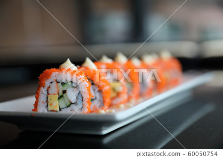 california roll sushi , rice roll with egg avocado egg and fish japanese food california roll sushi , rice roll with egg avocado egg and fish japanese food 60050754