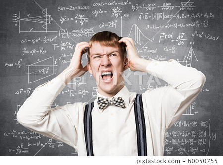 Stressful teenager screaming with panic Stressful teenager screaming with panic 60050755