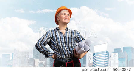 Attractive female engineer in hardhat 60050887
