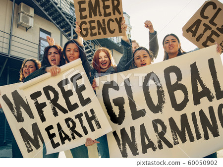 Young people protesting of climate emergency on the street 60050902
