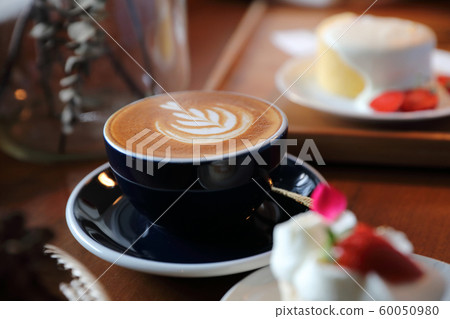 Cappuccino coffee break on wood background Cappuccino coffee break on wood background 60050980