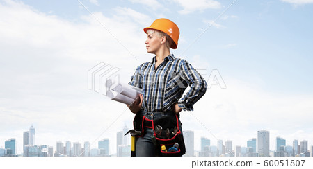 Attractive female engineer in hardhat Attractive female engineer in hardhat 60051807