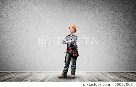 Attractive female engineer in hardhat 60052008