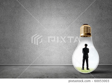 Businessman trapped in bulb 60053003