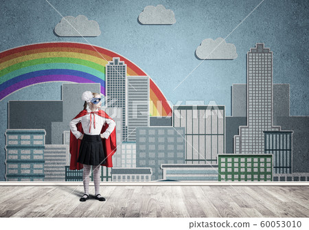 Girl power concept with cute kid guardian against drawn cityscape background. Mixed media Girl power concept with cute kid guardian against drawn cityscape background. Mixed media 60053010