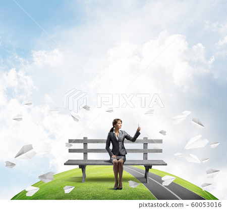Business woman taking selfie photo or chatting Business woman taking selfie photo or chatting 60053016