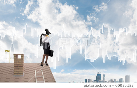 Concept of home security and privacy protection with camera headed woman 60053182