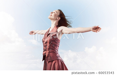 Concept of freedom and happiness with girl enjoying this life Concept of freedom and happiness with girl enjoying this life 60053543