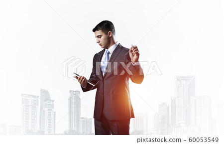 Front view of man in business suit and tie Front view of man in business suit and tie 60053549