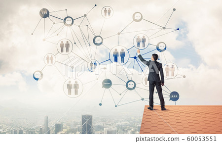 Businessman on house roof presenting networking and connection c Businessman on house roof presenting networking and connection c 60053551