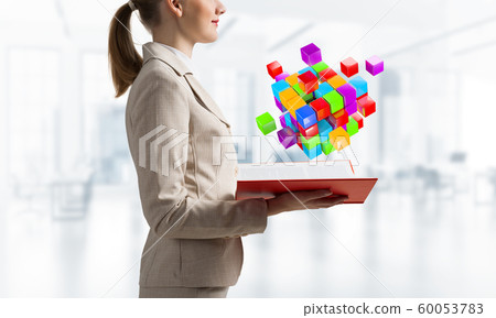 Woman showing colorful geometric 3d cubes Woman showing colorful geometric 3d cubes 60053783